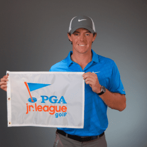 Rory McIlroy with PGA Jr. League flag